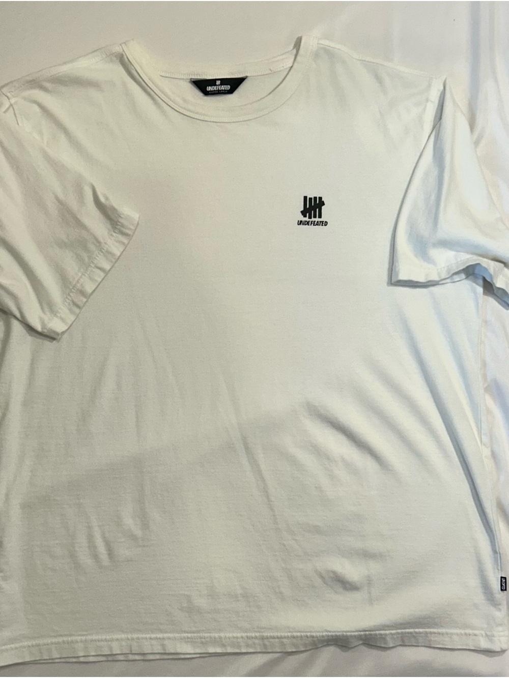 Undefeated White Crewneck T‑Shirt with Small Black Logo